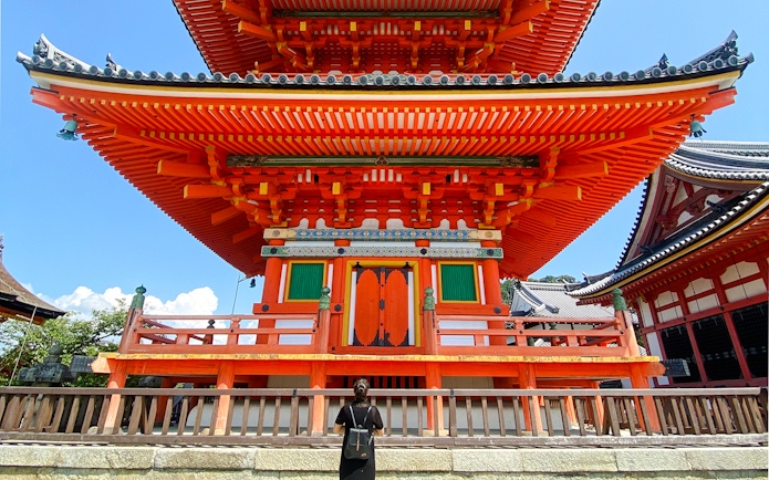 Kiyomizu-dera temple with vibrant red architecture in Kyoto, Japan.