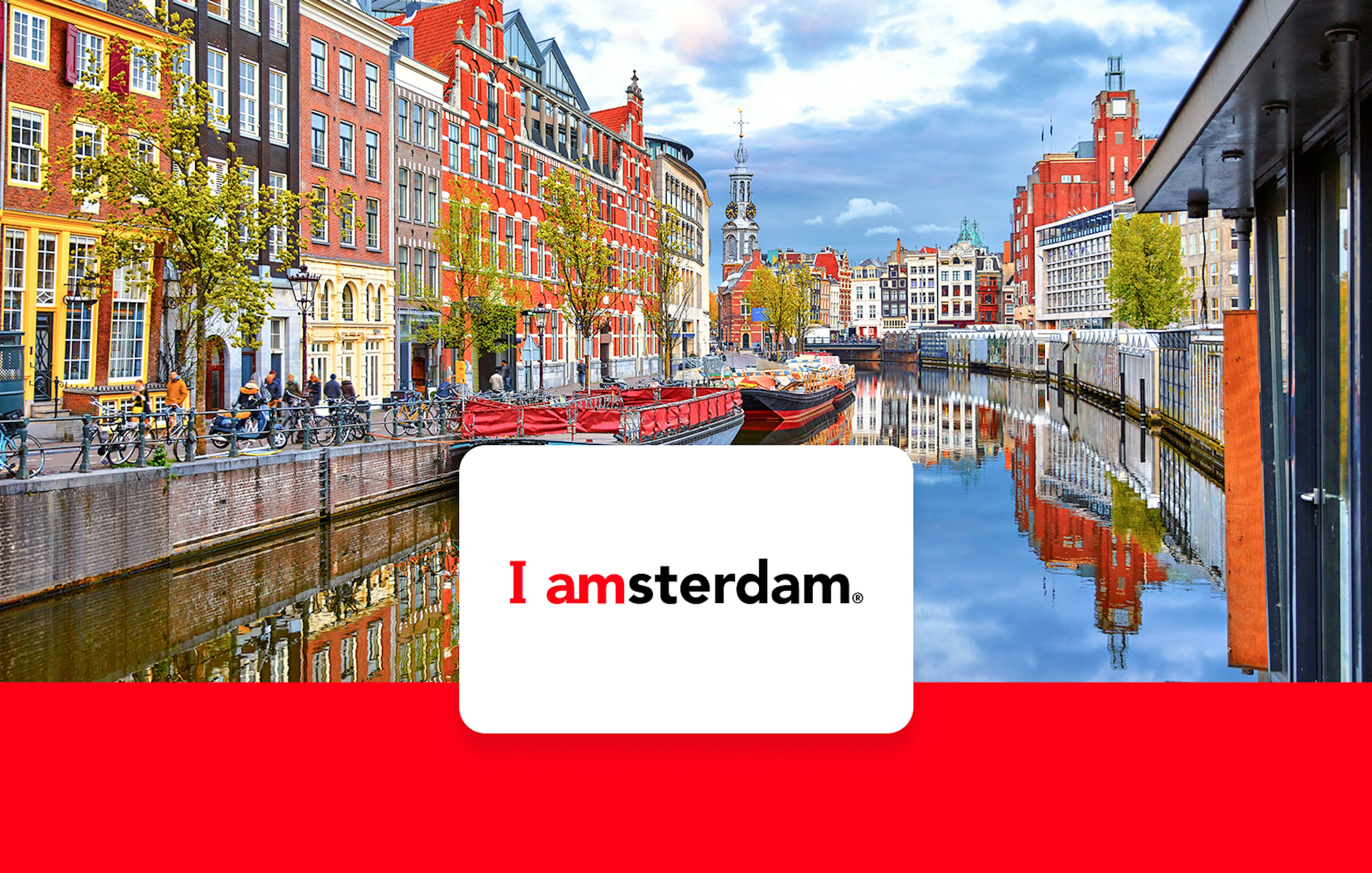 Amsterdam canal view with historic buildings and bicycles, promoting I Amsterdam City Card.