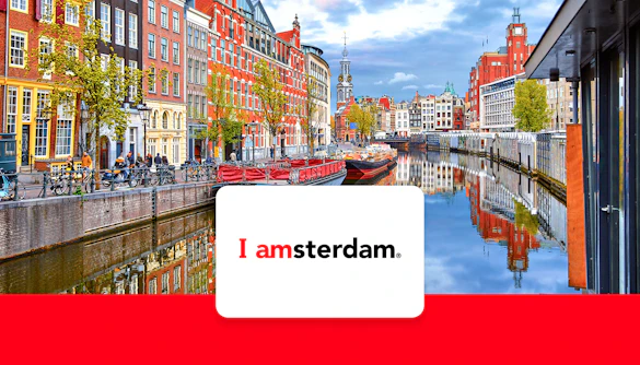 Amsterdam canal view with historic buildings and bicycles, promoting I Amsterdam City Card.
