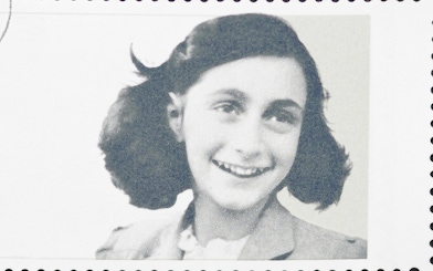 Young girl smiling on a postage stamp.