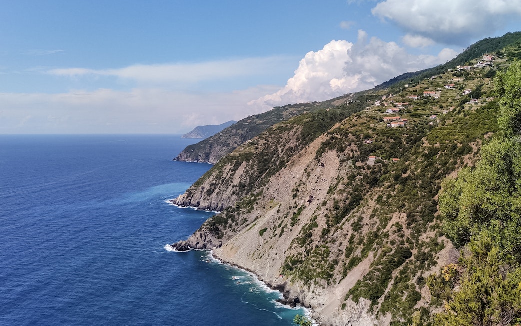 Cinque Terre coastline view from boat tour near La Spezia, Italy.