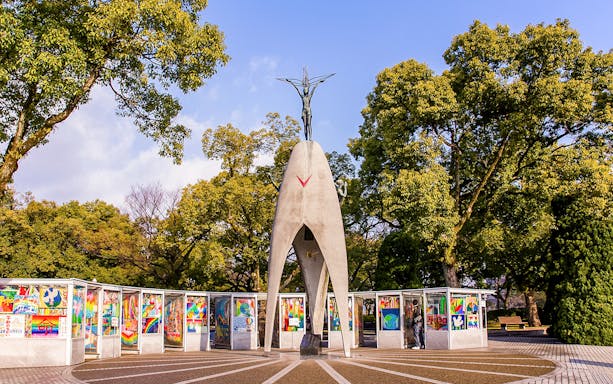 Children's Peace Monument with colorful artwork displays, Hiroshima Peace Park.