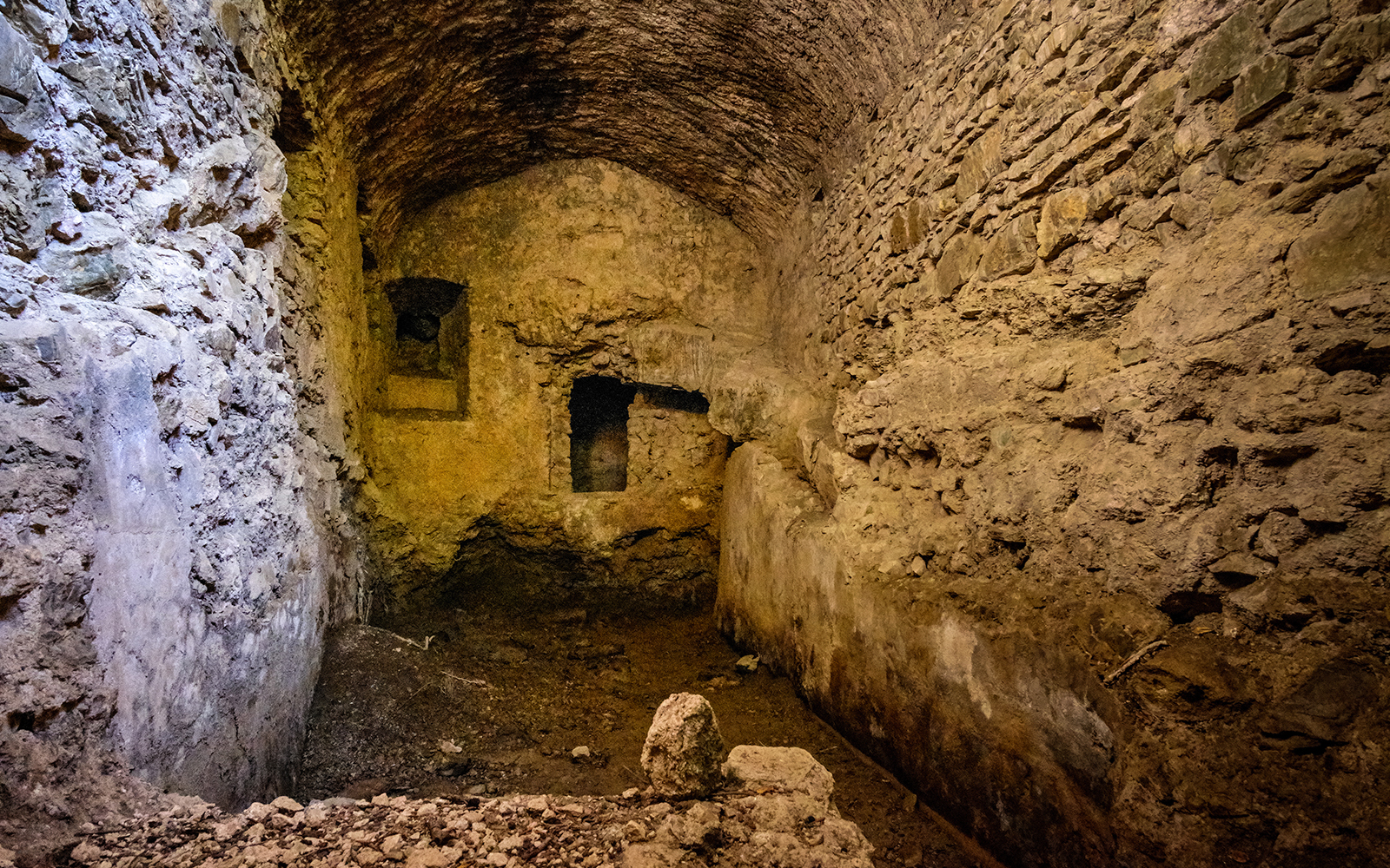 Graeco-Roman Theater ruins in Naples Underground, showcasing ancient architecture.