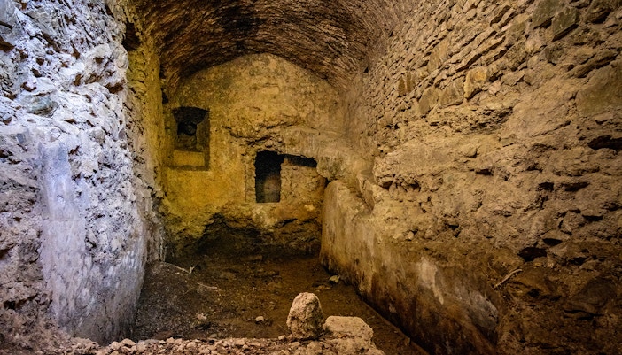 Graeco-Roman Theater ruins in Naples Underground, showcasing ancient architecture.