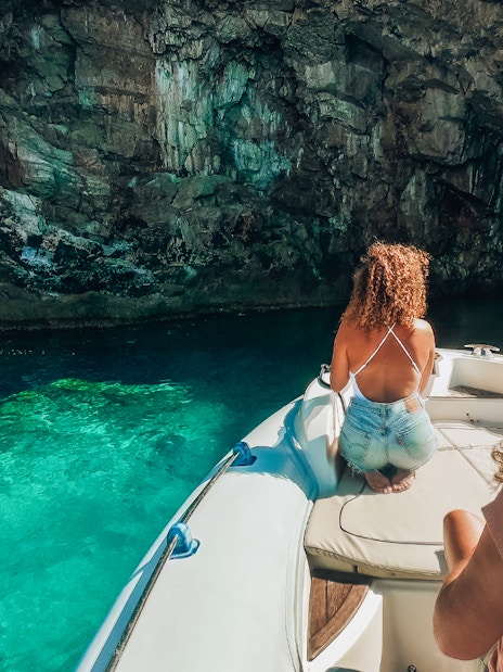 Private boat tour near Blue Cave, Dubrovnik, with passengers enjoying the view.