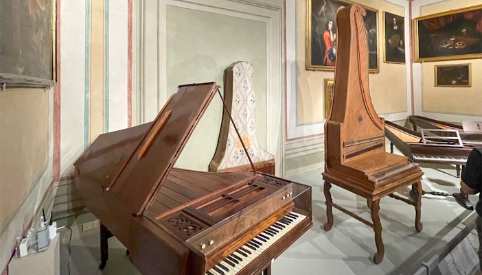 Antique pianos and harpsichord in Accademia Art Gallery's Music Museum, Florence.