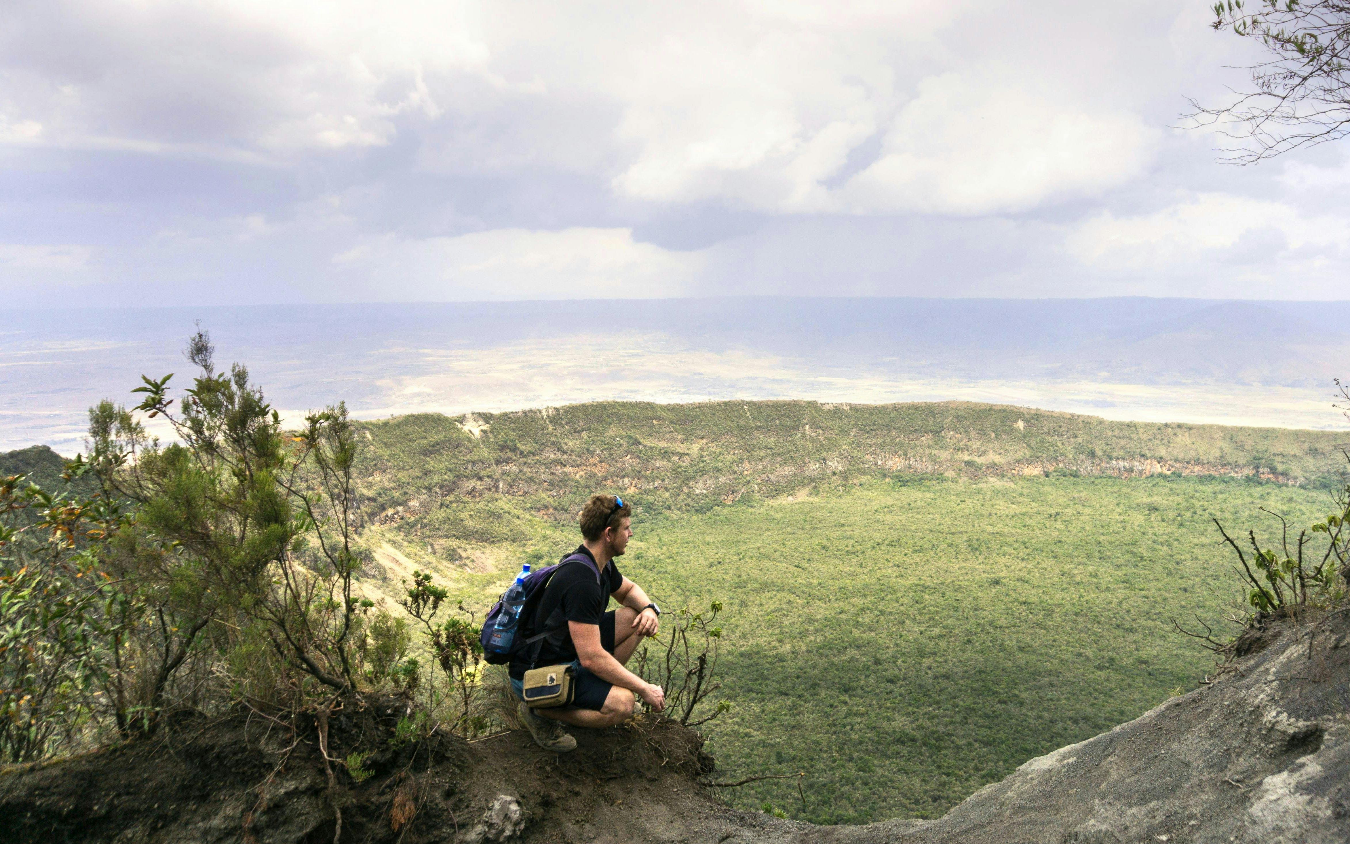 Person overlooking Mount Longonot crater, Maai Mahiu, near Nairobi.