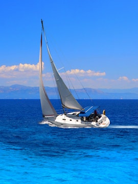 Sailing yacht on the Aegean Sea during a Santorini cruise.