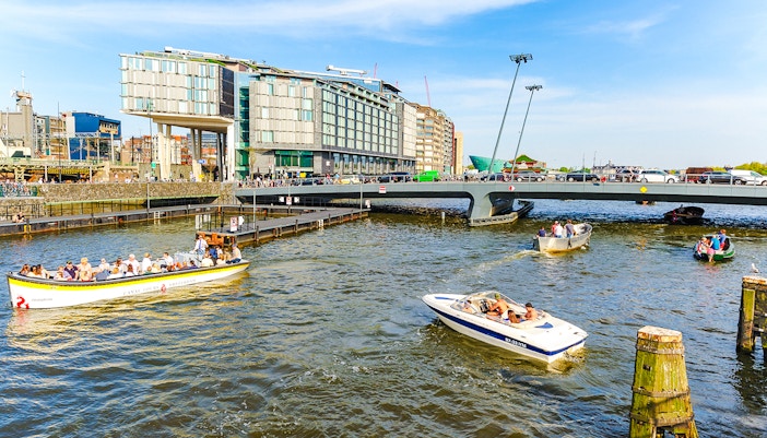 Boats on a canal near DoubleTree Hilton Hotel in Amsterdam.
