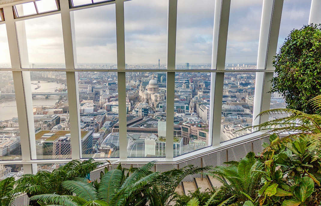 View of London skyline from Sky Garden with St. Paul's Cathedral visible.