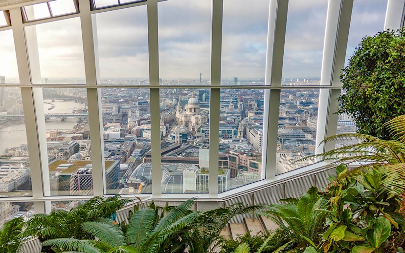 View of London skyline from Sky Garden with St. Paul's Cathedral visible.