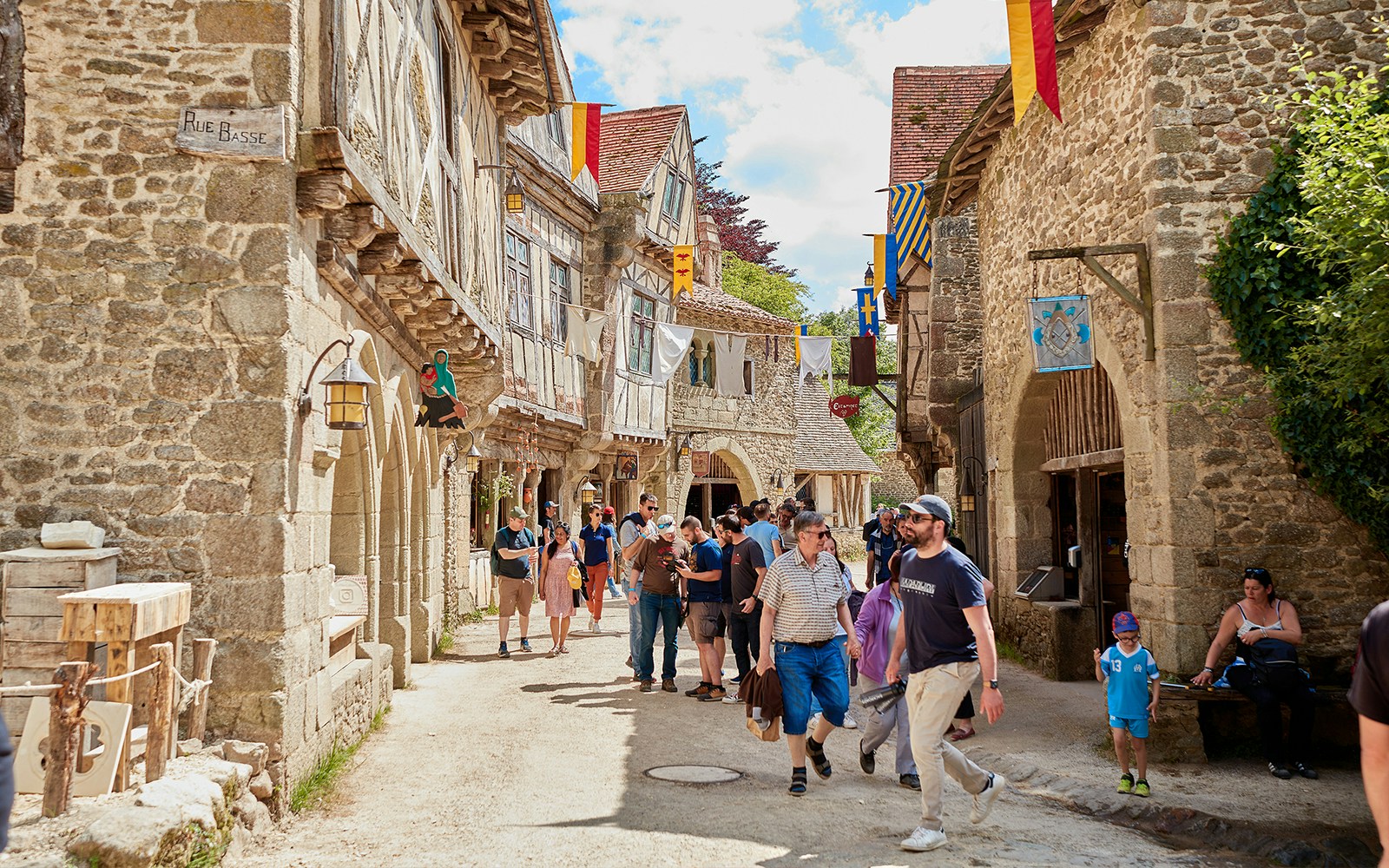 Puy du Fou France historical reenactment with actors in period costumes.