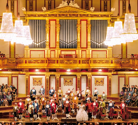 Orchestra performing at Vienna Music Association concert hall.
