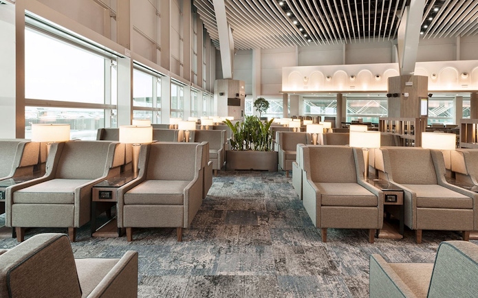 Plaza Premium Lounge seating area in Schengen Area Departures Terminal 1, Fiumicino Airport.