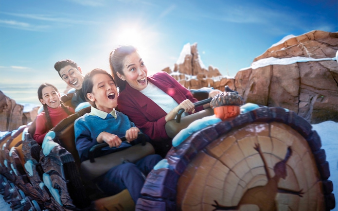 Families enjoying a roller coaster ride at Genting SkyWorld Outdoor Theme Park.