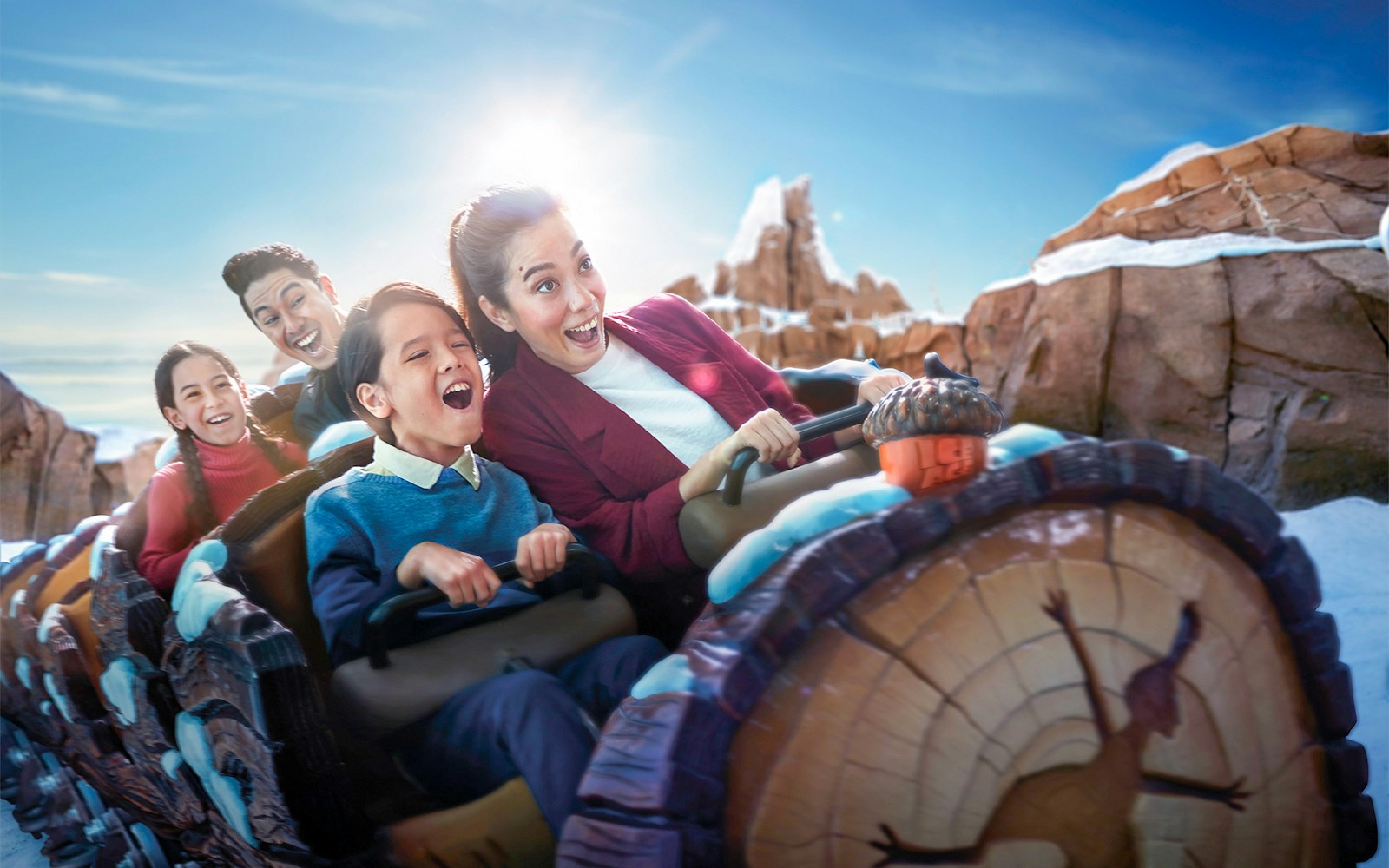 Families enjoying a roller coaster ride at Genting SkyWorld Outdoor Theme Park.