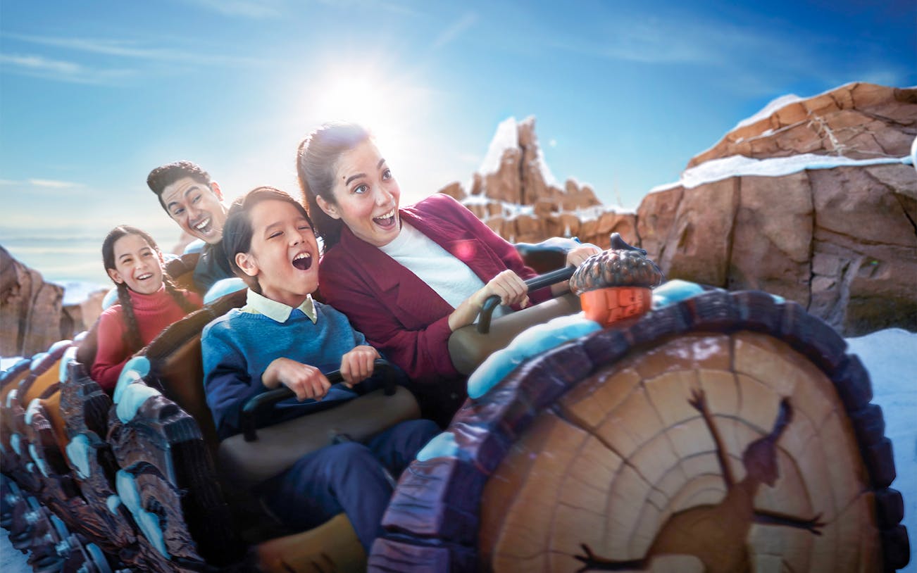 Families enjoying a roller coaster ride at Genting SkyWorld Outdoor Theme Park.