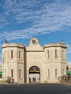 Fremantle Prison entrance under a sunny sky, Western Australia.
