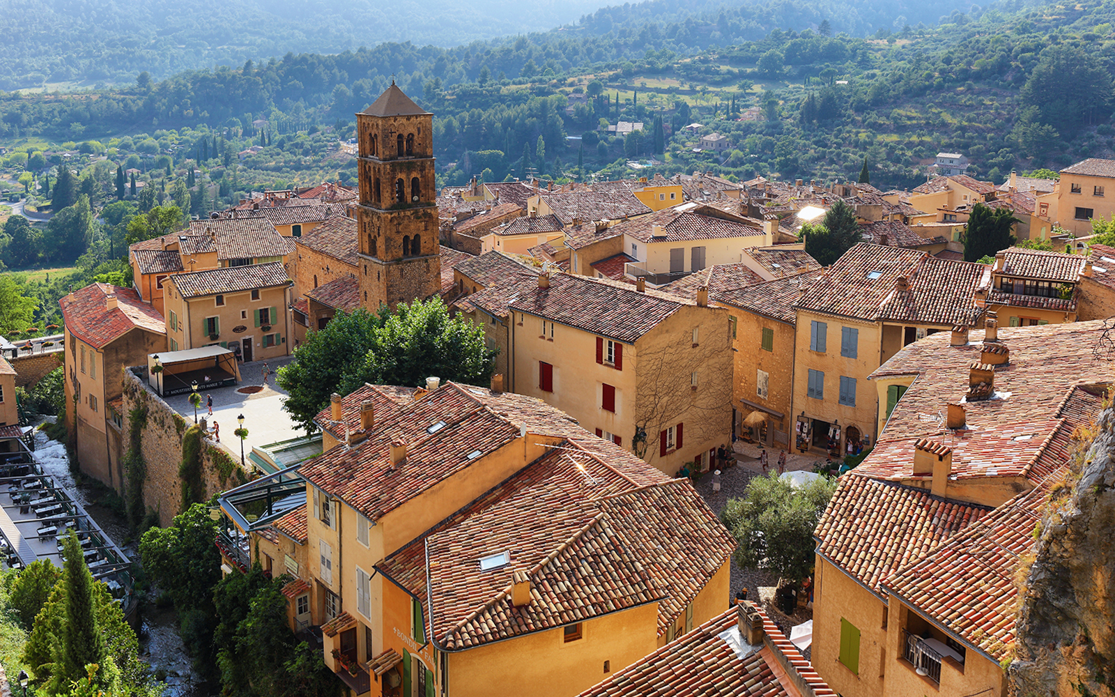 Hilltop village with terracotta roofs near Gorges du Verdon, France, on sightseeing tour.