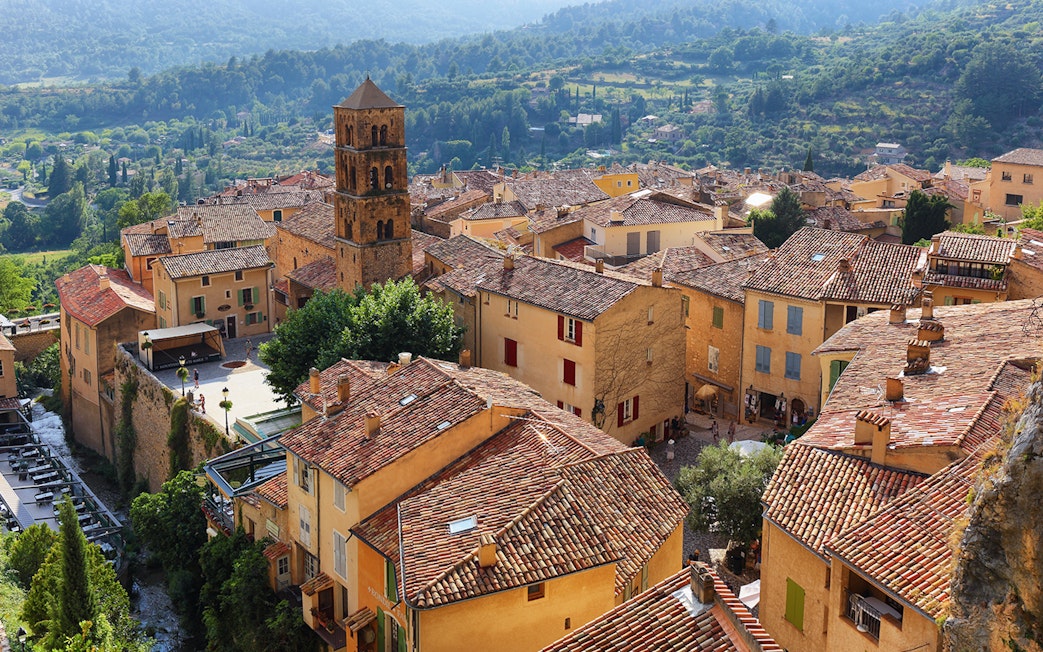Hilltop village with terracotta roofs near Gorges du Verdon, France, on sightseeing tour.