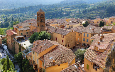Hilltop village with terracotta roofs near Gorges du Verdon, France, on sightseeing tour.