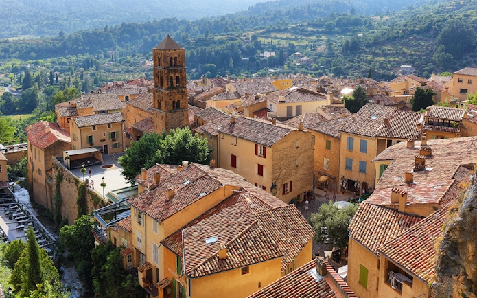 Hilltop village with terracotta roofs near Gorges du Verdon, France, on sightseeing tour.