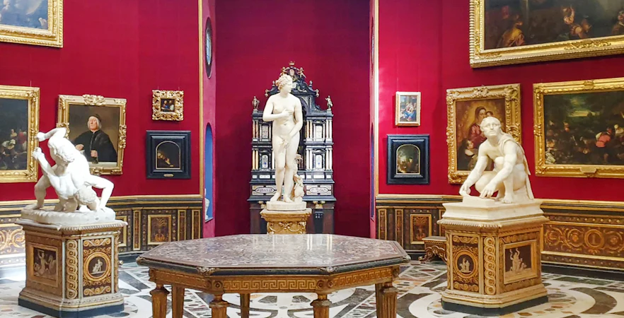 Statues and paintings in the Tribune room, Uffizi Gallery, Florence.