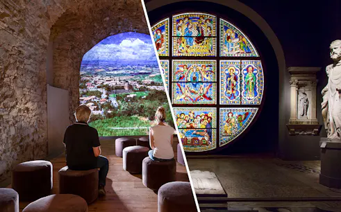 Visitors viewing Siena landscape and stained glass art in Val D'Orcia exhibit.