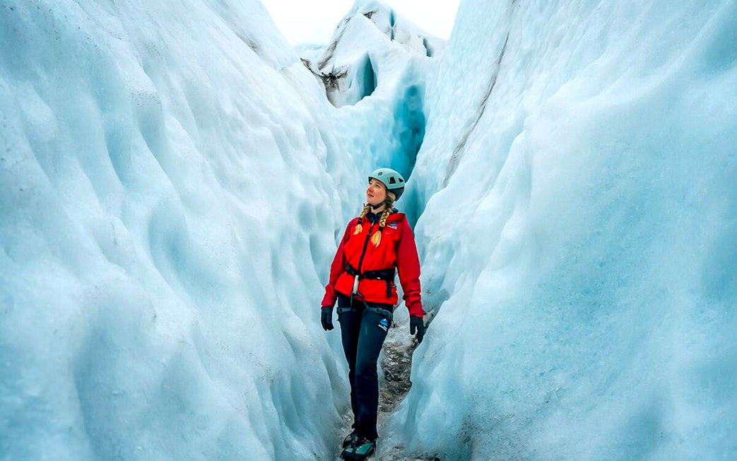 Guests exploring ice maze and glacier crevasses in Skaftafell, Iceland.