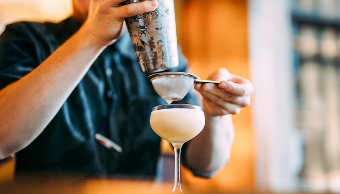 drink being prepared at a distillery