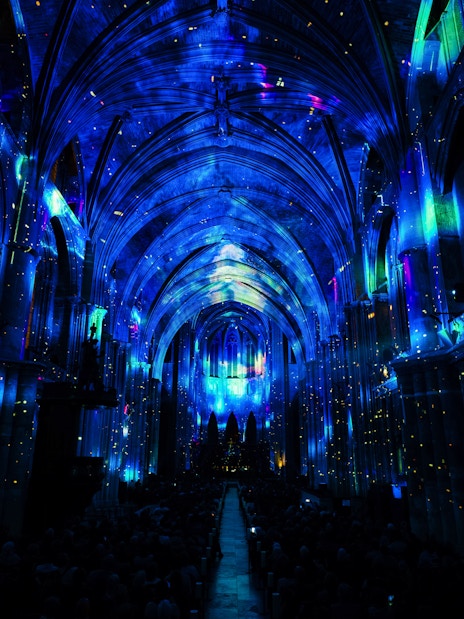 Manchester Cathedral interior illuminated during LUMINISCENCE 360° Immersive Show.