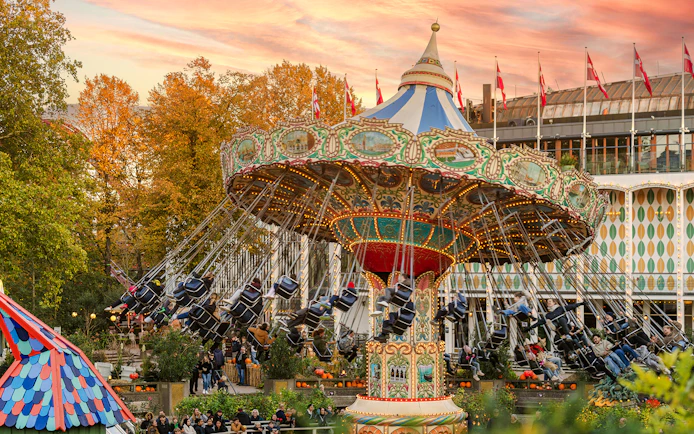 Guests on swing ride during Halloween at Tivoli Gardens, Copenhagen.