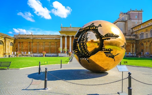 Vatican Museums courtyard with Arnaldo Pomodoro's Sphere sculpture, Rome.