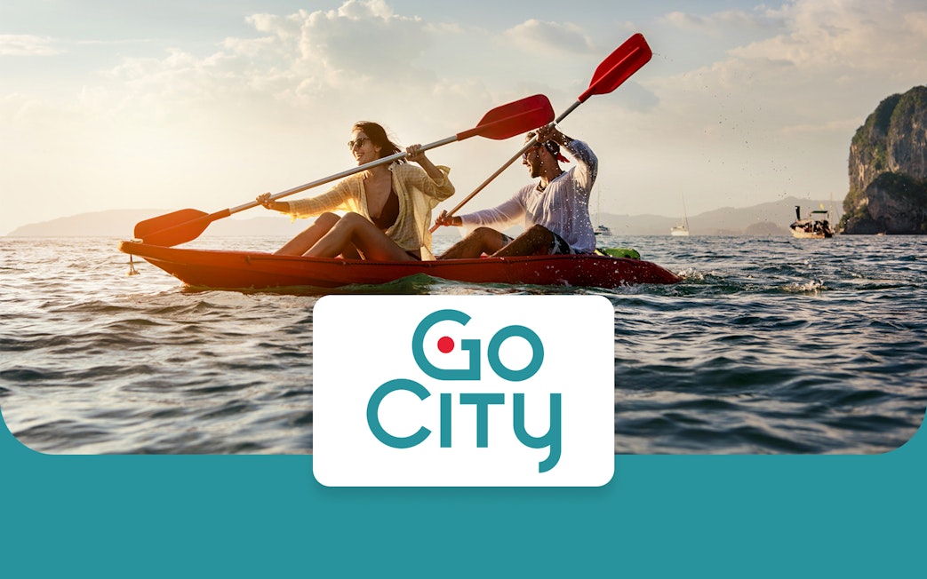 Couple kayaking on ocean near San Diego with Go City Explorer Pass.
