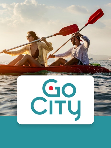 Couple kayaking on ocean near San Diego with Go City Explorer Pass.