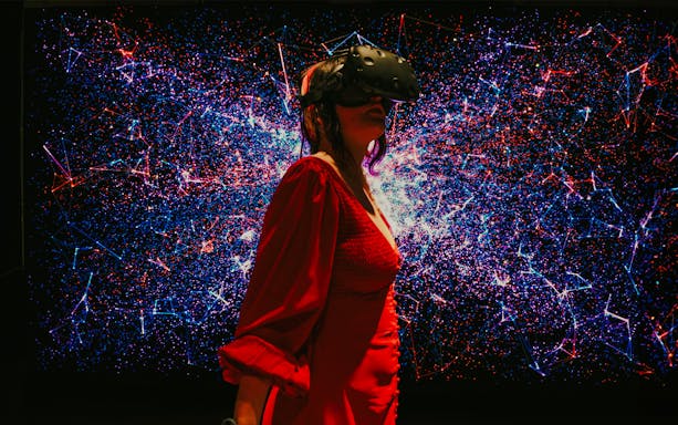 Person experiencing virtual reality at Sentosa attraction.