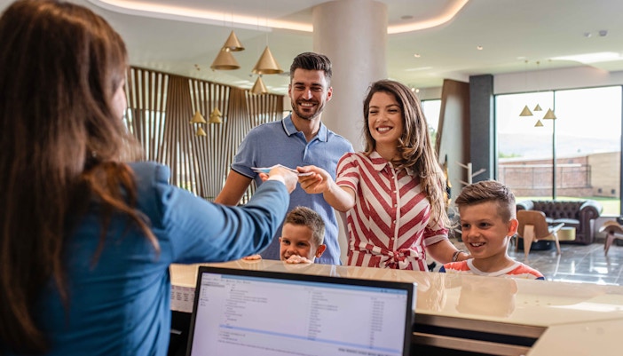 Family checking in at Disney's Hollywood Hotel