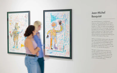 Jean-Michel Basquiat artworks displayed at Moco Museum, London.