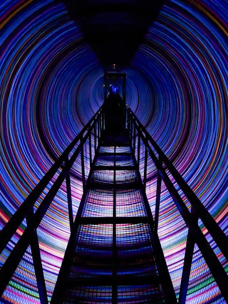 Colorful spinning tunnel at The Vortex, World Of Illusions.