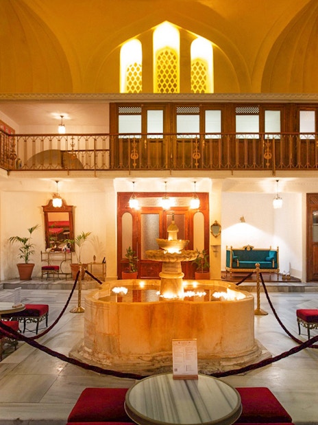 Cagaloglu Hammam interior with central fountain and traditional decor in Istanbul.