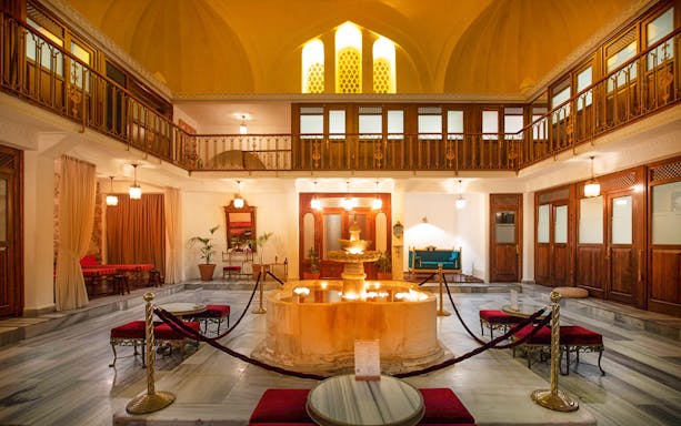 Cagaloglu Hammam interior with central fountain and traditional decor in Istanbul.