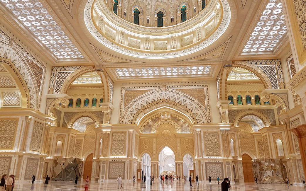 Interior of Qasr Al Watan in Abu Dhabi, showcasing intricate architecture and ornate ceilings.