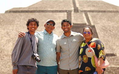 Group posing in front of Pyramid of the Sun, Teotihuacán tour from Mexico City.