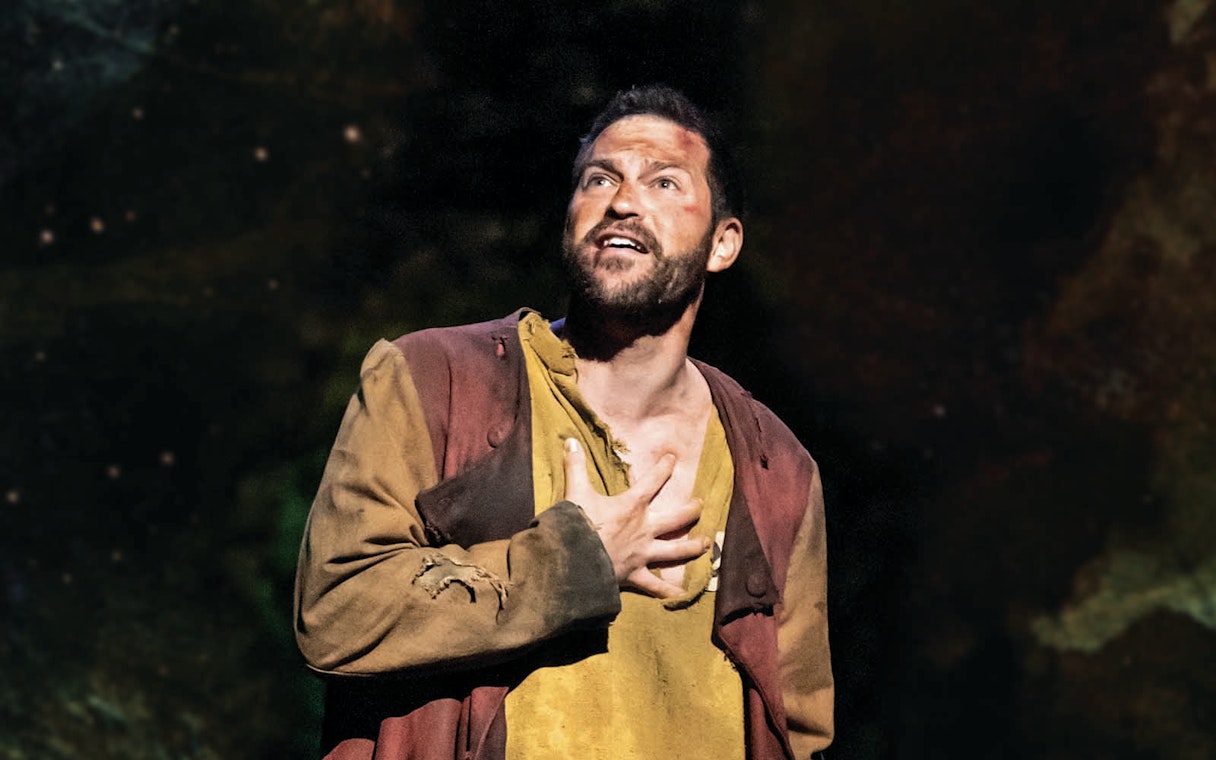 Actor performing in Les Miserables stage production.