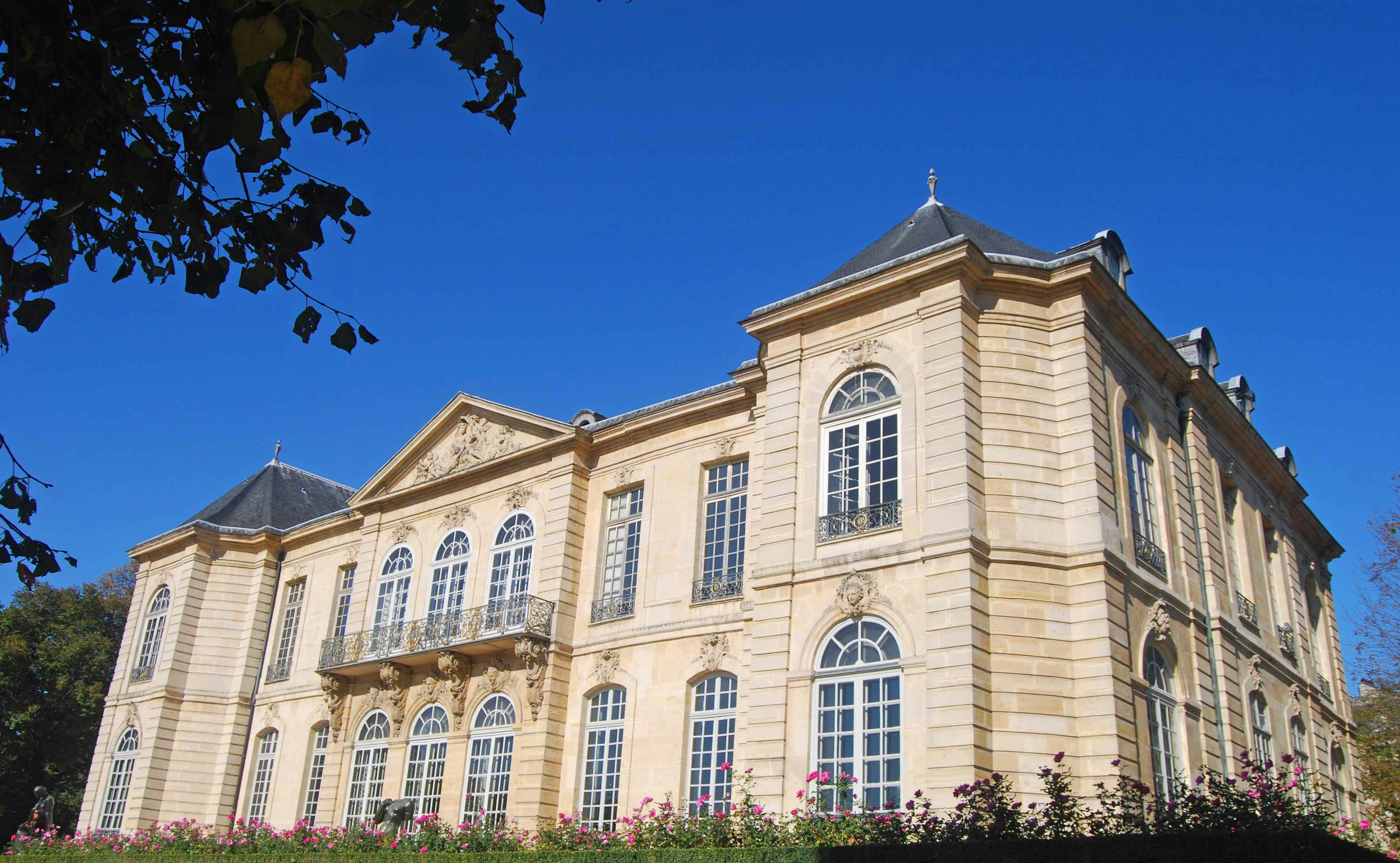 Hotel Biron in Paris, showcasing its classic architecture and garden.