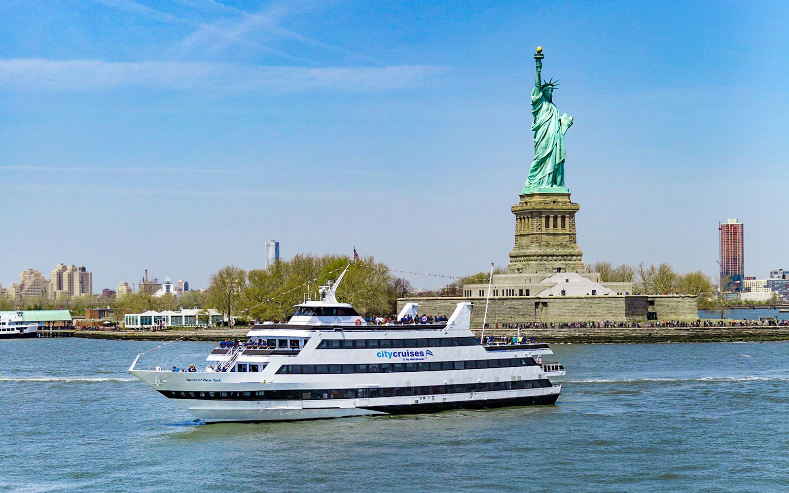 New York City skyline view from a dinner cruise boat on the Hudson River.