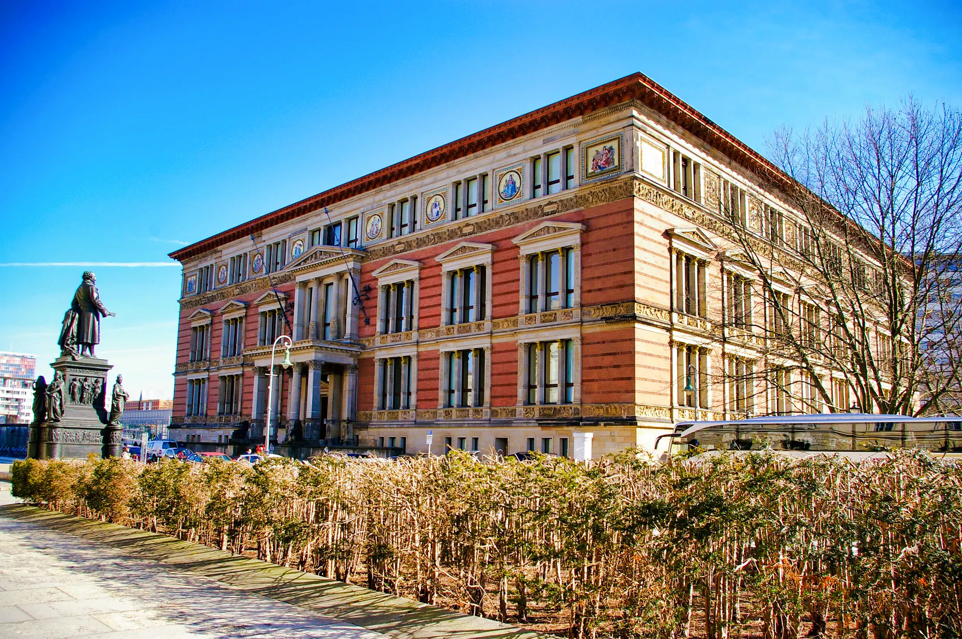 Berlin historical building with statue, part of WWII sites tour.