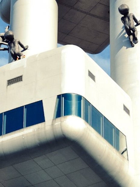 Zizkov TV Tower exterior with sculptures in Prague, Czech Republic.
