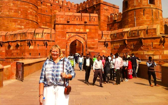 Visitors at Agra Fort during Taj Mahal/Agra day tour from Delhi by train.