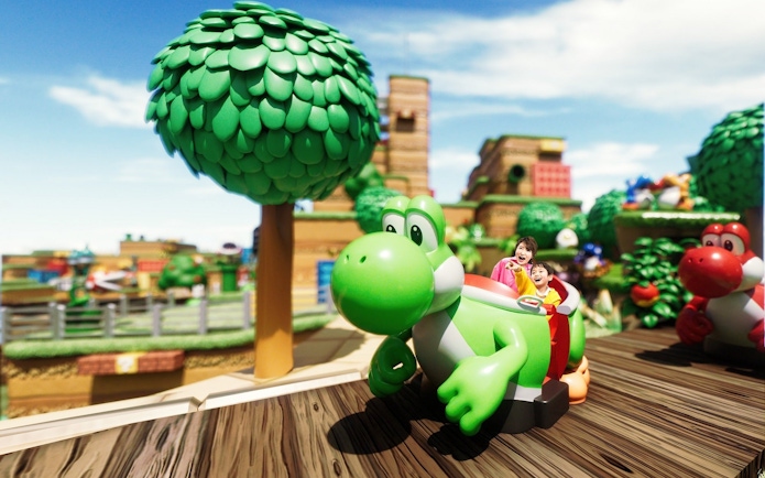 Visitors enjoying Yoshi's Adventure ride at Super Nintendo World, Universal Studios Japan.